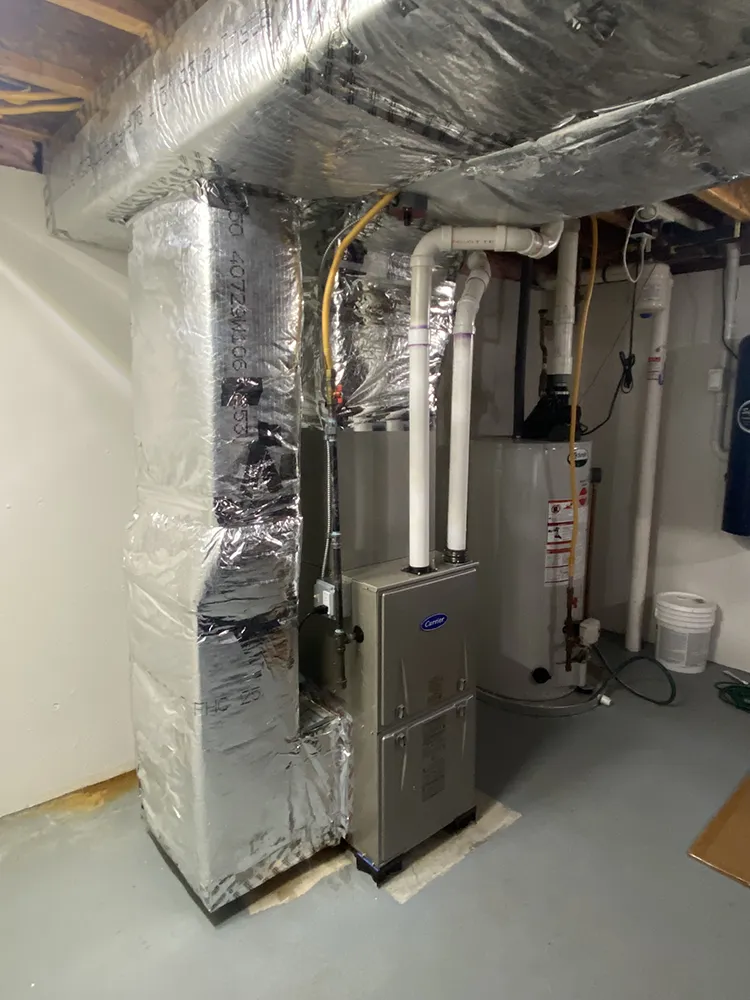  A new energy-efficient Carrier gas furnace was installed to replace the old furnace installed over 20 years ago.